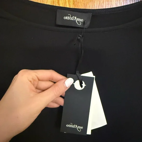 Elegant Black Long Sleeve Blouse with Feather Detail - Picture 8 of 11